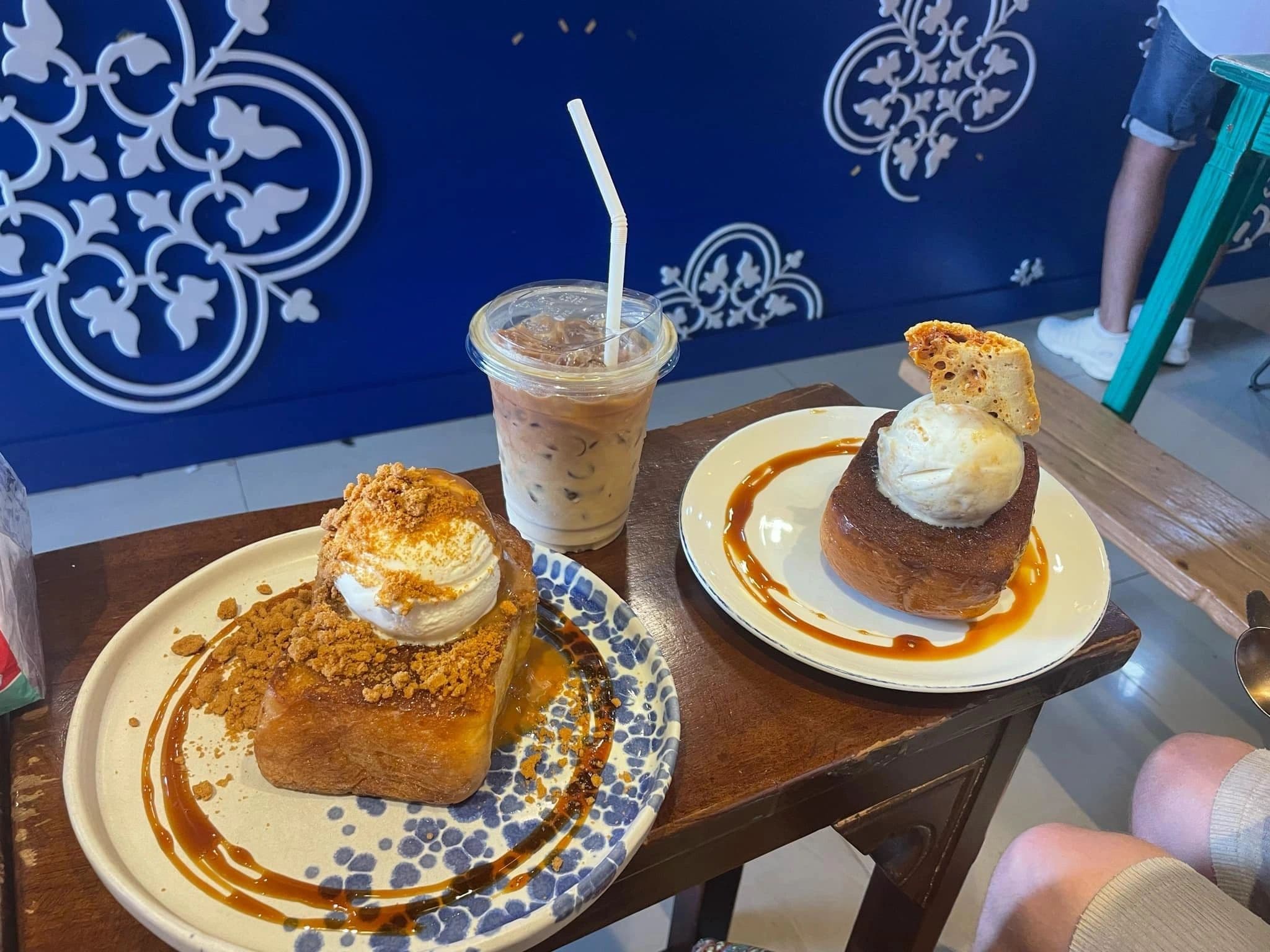 Honey toast with ice cream and iced coffee at a cafe