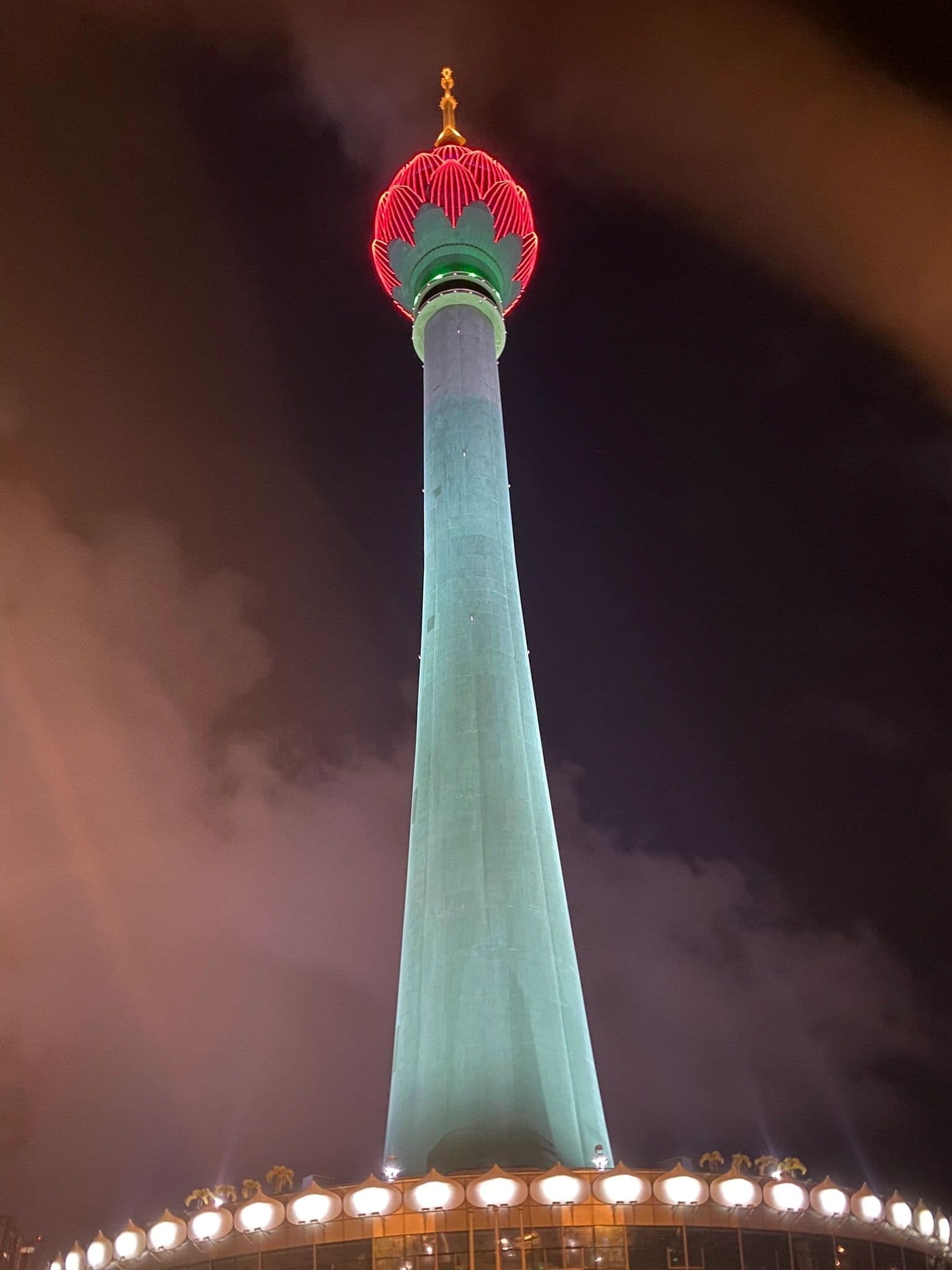 Lotus Tower lit up at night in Colombo, Sri Lanka